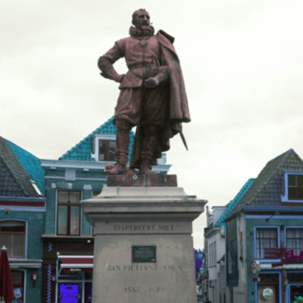 Statue of Jan Pieterszoon Coen on pedestal in street in Hoorn in the Netherlands.